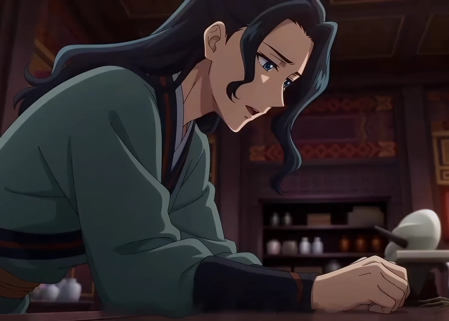 Suirei looking sorrowfully down at a table